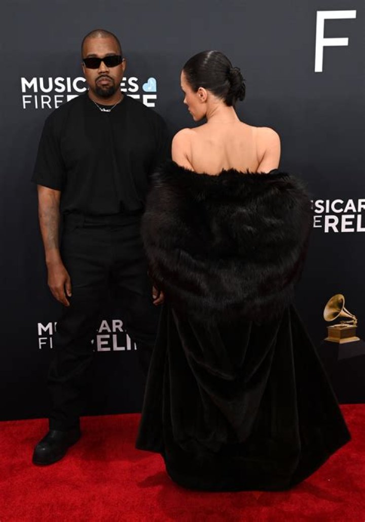 Bianca Censori Covers Herself Entirely in Flowing Dress During Japan Trip With Kanye West: Photos