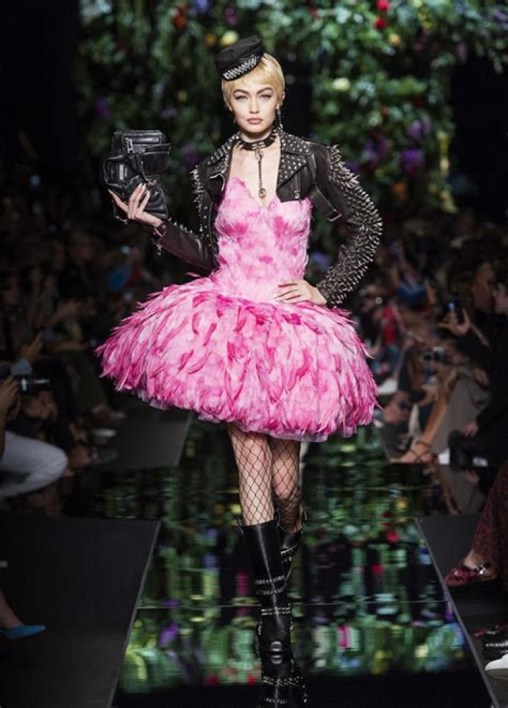Gigi Hadid, Kaia Gerber & Bella Hadid Walk The Runway In Quirky Dresses At Moschino’s MFW Show
