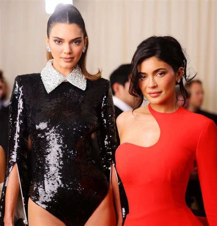 Hailey Baldwin Wears Very Little & Covers Herself With A Purse In Sexy Versace Campaign With Kendall Jenner