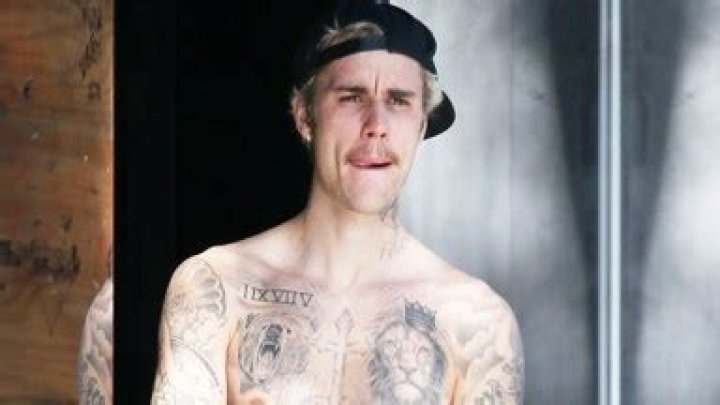 Justin Bieber Shows Off His Chest Tattoos & Controversial Dreadlocks In New Shirtless Pic