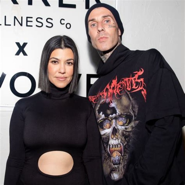 Kourtney Kardashian & Travis Barker Are A Clone Couple In Matching Sweatsuits: Photo