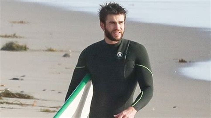 Liam Hemsworth Flashes Huge Bulge In Skintight Wetsuit On Malibu Beach – Hollywood Life