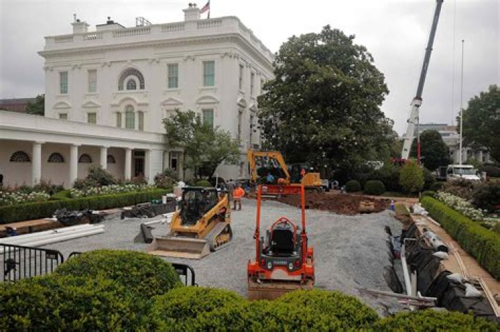 Melania Trump’s $700 Sky-High Heels Sink Into Ground & Get Dirty As She Plants Tree On White House Lawn