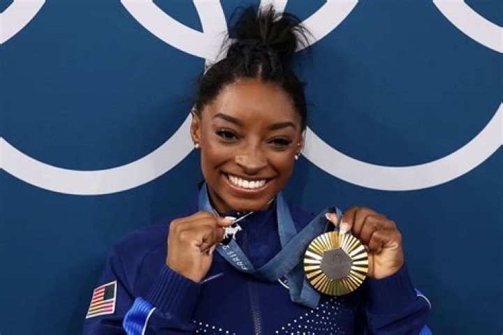 Simone Biles Admits She Feels Like The ‘Weight Of The World’ Is On Her Ahead Of Olympic Finals